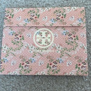 Never used Tory Burch gift box with Velcro. 8 x 7 x 4